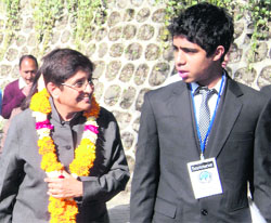 Kiran Bedi with a student at Woodstock School in Mussoorie on Friday. 