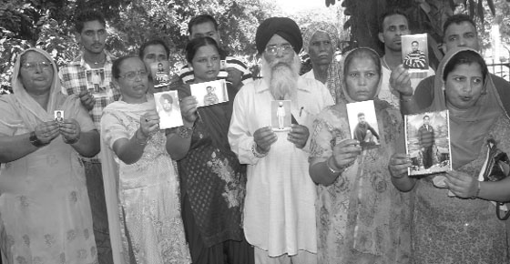 A file photo of family members of youths stuck in Kuwait demanding action against travel agents and intervention of the Union External Affiars Ministry for their rescue. 