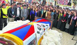 Tibetans pay homage to Jamphel Yeshi, who committed self-immolation in New Delhi, at McLeodganj in Dharamsala on Friday.
