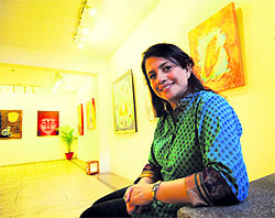 Kirandeep Kaur at the venue where her art exhibits are displayed in Ludhiana on Friday