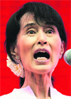 Pro-democracy leader Aung San Suu Kyi addresses a press conference in Yangon