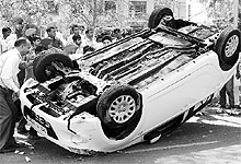 The car that overturned near the Kumbra-Sohana traffic light point in Mohali on Saturday