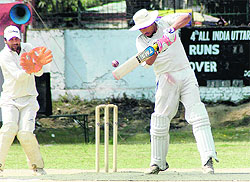 A batsman in action in a match during the 4th Uttarakhand Cricket Tournament in Dehradun on Saturday