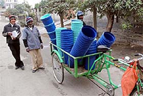 Dustbins being distributed in Bathinda