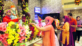 Devotees offer prayers at Sri Sai Baba temple on the occasion of Ramnavami in Chandigarh on Sunday.