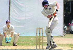 A batsman in action in a match during the 4th Uttarakhand Cricket Tournament in Dehradun on Sunday
