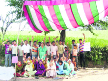 Villagers stage a dharna at Thana village in Nurpur on Sunday. 