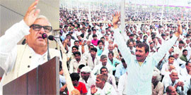Chief Minister Bhupinder Singh Hooda addresses a rally in Palwal on Sunday.