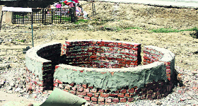 the under-construction drainage system at the ashram in Budhiana village. 