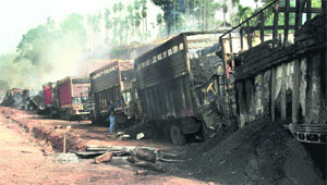 The Garo National Liberation Army set on fire 15 coal-laden trucks at NH-62 in Nangalbibra, Meghalaya, on Saturday. The outfit is fighting for a 'sovereign Garoland' in western areas of the state. 