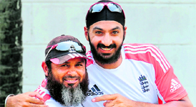 Englands Monty Panesar (right) poses with spin bowling coach Mushtaq Ahmed during a training session ahead of their second Test against Sri Lanka in Colombo.