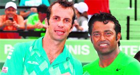 Radek Stepanek of the Czech Republic (L) and Leander Paes hold their trophy after they won the mens doubles title at the Sony Ericsson Open in Key Biscayne.