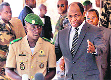 Malian junta leader Captain Amadou Sanogo (L) and Burkina Fasos Foreign Minister Djibrill Bassole on Sunday. 