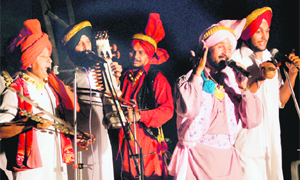 Folk singer Bhupinder Bubal performs at the Punjab Kala Bhawan in Chandigarh on Monday.