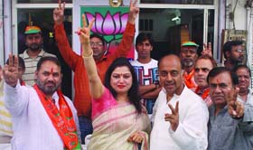 BJP candidate from ward No. 70 Rana Pratap Bagh with party leaders Renu Gupta and Vijay Goel during campaigning in New Delhi on Monday
