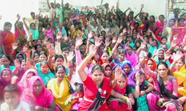 Members of the Beghar Samiti stage a protest outside the Vidhan Sabha in Dehradun on Monday.