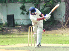 A batsman in action in a match during the 4th Uttarakhand Cricket Tournament in Dehradun on Monday.