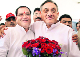 Chief Minister Vijay Bahuguna and state Congress chief and Cabinet Minister Yashpal Arya in Dehradun on Monday.