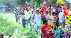 Pilgrims head towards the Junga Devi temple near Badrol village on Monday.