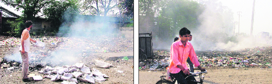 Garbage and unwanted material being burnt at the railway station and Aman Nagar in Ludhiana.