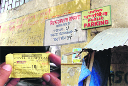 The parking rate chart painted on a wall on the premises of the Civil Hospital; and (inset) a parking slip meant for cars being given to owners of two-wheelers. 