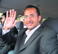 Zakarya Ahmad al Fattah, brother of Osamas youngest widow Amal al Sadeh, waves to the media after attending court proceedings in Islamabad on Monday.