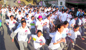 Girls take part in a race to create awareness on health organised by Loreto Convent Tara Hall School in Shimla.