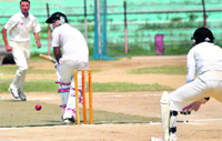 A batsman plays a shot during the Rajeev Gandhi T20 Cricket Tournament at MA Stadium in Jammu