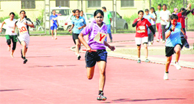 Athletes participate in a 4x100 relay race at the state-level inter-polytechnic sports meet in Jalandhar on Tuesday.