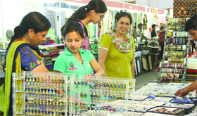 Buy me this jewellery! A mother-daughter duo looks at earrings during an exhibition in Jalandhar on Tuesday.