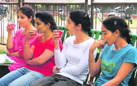 Students enjoy tea on a pleasant morning at Punjab Agricultural University in Ludhiana on Tuesday