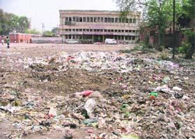 Garbage dumped in a vacant space at the Railway Station Complex in Ludhiana