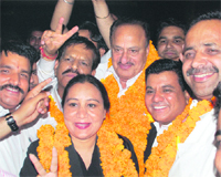Newly elected president NK Nanda strike a pose along with her team after winning the District Bar Association elections in Chandigarh