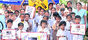 Students of St Soldier Divine Public School participate in an anti-alcohol awareness rally in Jalandhar on Wednesday. 