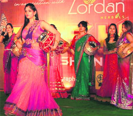 Members of the Lakshmi Ladies Club walk on the ramp at their club in Ludhiana on Wednesday. 