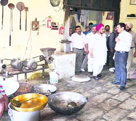 Health department officials during a raid at a sweets shop in Amritsar on Thursday