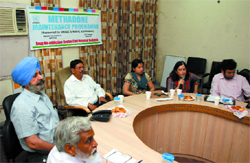 Experts take part in a workshop organised to sensitise the staff involved in the methadone treatment project in Bathinda on Thursday. 
