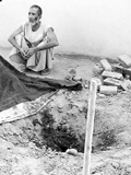 Bagichi Nath sits near the spot where the body of Thanedar Nath was exhumed at the Dudhadhari Dera in Mubarikpur, near Dera Bassi