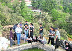 Darab Nagarwalla (second from left) of Woodstock School with Tibetan students at Turner Organic Farm.