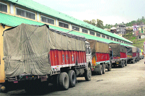 Loaded trucks parked outside the Food Corporation of India (FCI) godown in Rajouri. Thousands of tonnes of food grains, which are to be delivered to various depots across Rajouri district, have remained at the FCI stores for the past 10 days owing to an indefinite strike by the corporation workers.