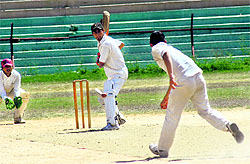 A cricket match in progress during the Rajeev Gandhi Twenty20 Cricket Tournament at MA Stadium in Jammu on Thursday