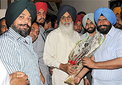 Chief Minister Parkash Singh Badal arrives to a warm welcome in Bathinda on Friday. Mayor Baljit Singh Beer Behman is also seen in the picture