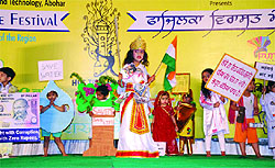 Tiny-tots hold placards appealing to the audience to conserve water, ecology and check female foeticide, at the Fazilka Heritage Festival
