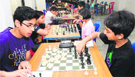 Jaskirat Singh (right) makes a move against Tejas Nagpal in the final round of the chess tournament at St Xaviers School in Chandigarh on Friday.