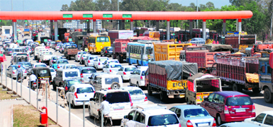 Long queues of vehicles at the toll plaza on the Panchkula-Shimla highway at Chandi Mandir on Friday.