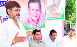Harak Singh Rawat supporters stage a protest in Haridwar on Friday.