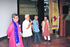 Renowned film actor Om Puri (second from left) addresses the delegates at a seminar on 100 Years of Indian Cinema organised by the Institute of Mass Communication and Media Technology on the Kurukshetra University campus on Friday. 