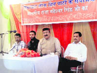 HLP chief Maheshwar Singh addresses a press conference at Palampur on Friday. 