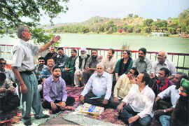 Writers of the state attend a literary session during the Writers Camp at Mansar Lake in Samba district on Friday. 