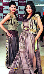 Models walk the ramp wearing collections of students of the INIFD, earlier showcased at the Lakme India Fashion, in Jalandhar on Thursday